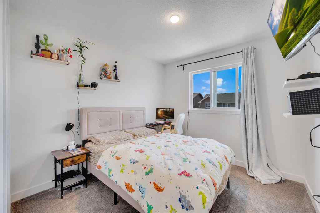 MLS® A2248211 - 239 Sundown Road  in Sunset Ridge Cochrane, Residential
