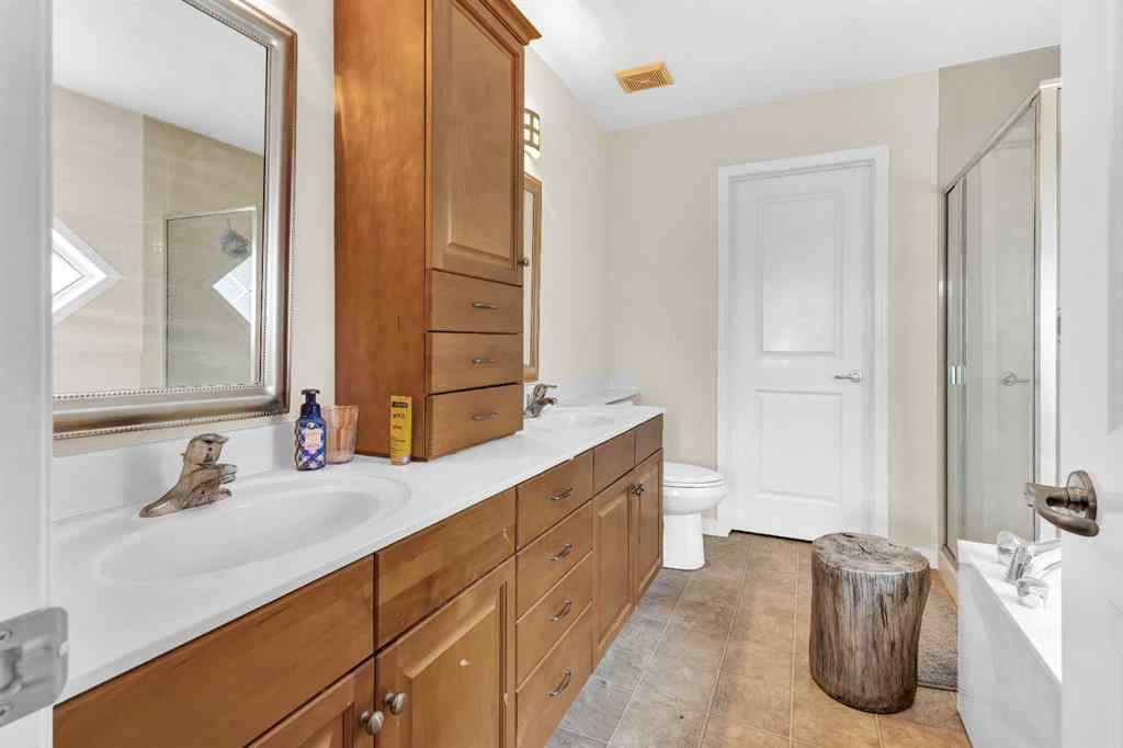 MLS® A2248243 - 511 Cresthaven Place SW in Crestmont Calgary, Residential