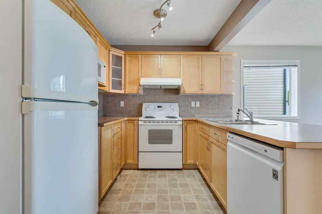 MLS® A2248253 - 47 Country Village Circle NE in Country Hills Village Calgary, Residential