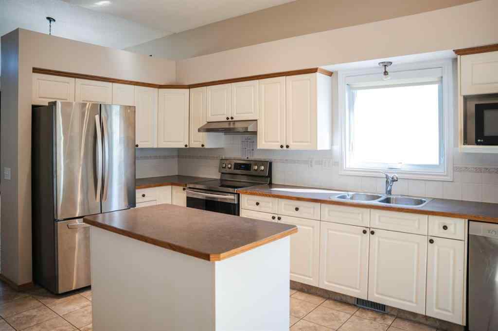MLS® A2248257 - 445 Rocky Ridge Bay NW in Rocky Ridge Calgary, Residential