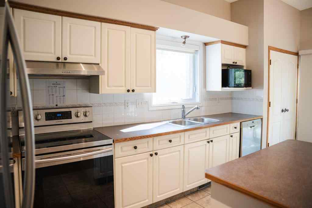 MLS® A2248257 - 445 Rocky Ridge Bay NW in Rocky Ridge Calgary, Residential