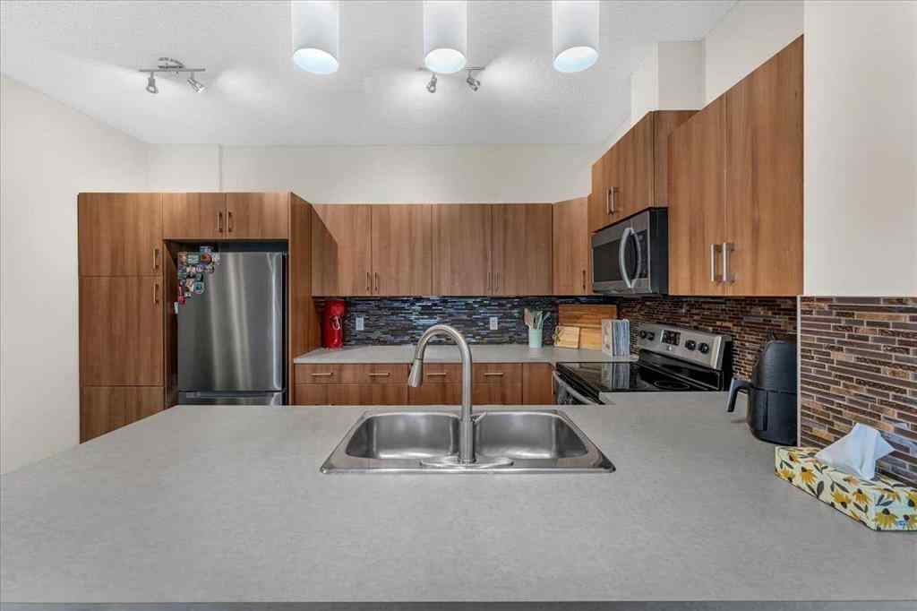 MLS® A2248261 - Unit #315 10 Auburn Bay Avenue SE in Auburn Bay Calgary, Residential