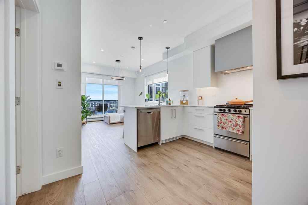 MLS® A2248279 - Unit #402 8230 Broadcast Avenue  in West Springs Calgary, Residential