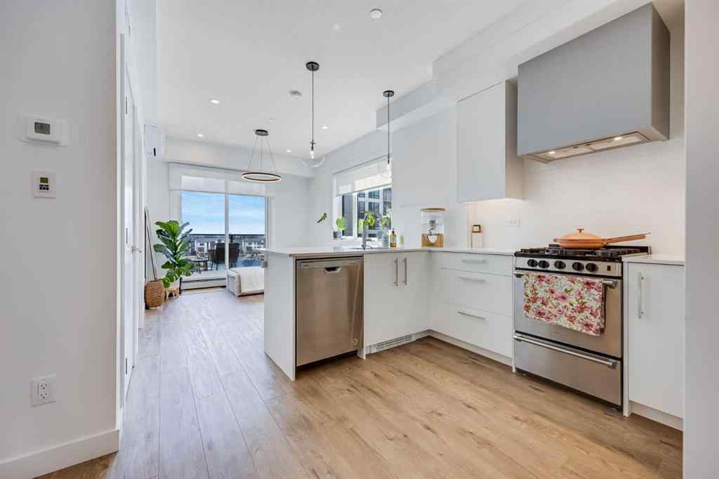MLS® A2248279 - Unit #402 8230 Broadcast Avenue  in West Springs Calgary, Residential