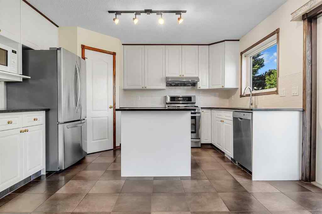 MLS® A2248281 - 62 Arbour Wood Crescent NW in Arbour Lake Calgary, Residential