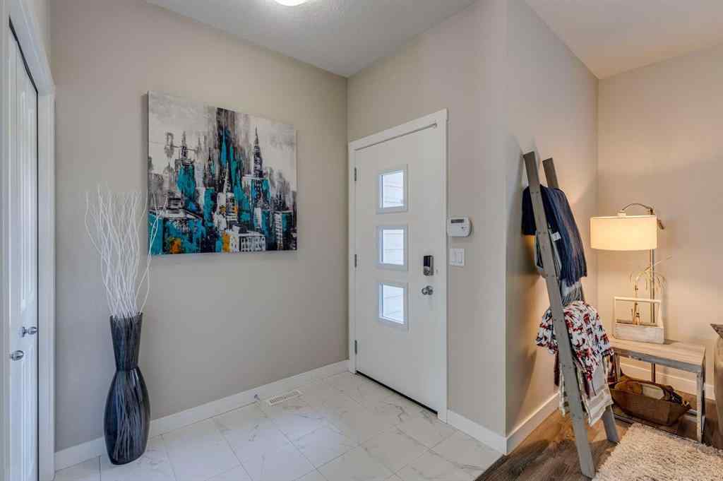 MLS® A2248286 - 385 Midtown Gate SW in Midtown Airdrie, Residential