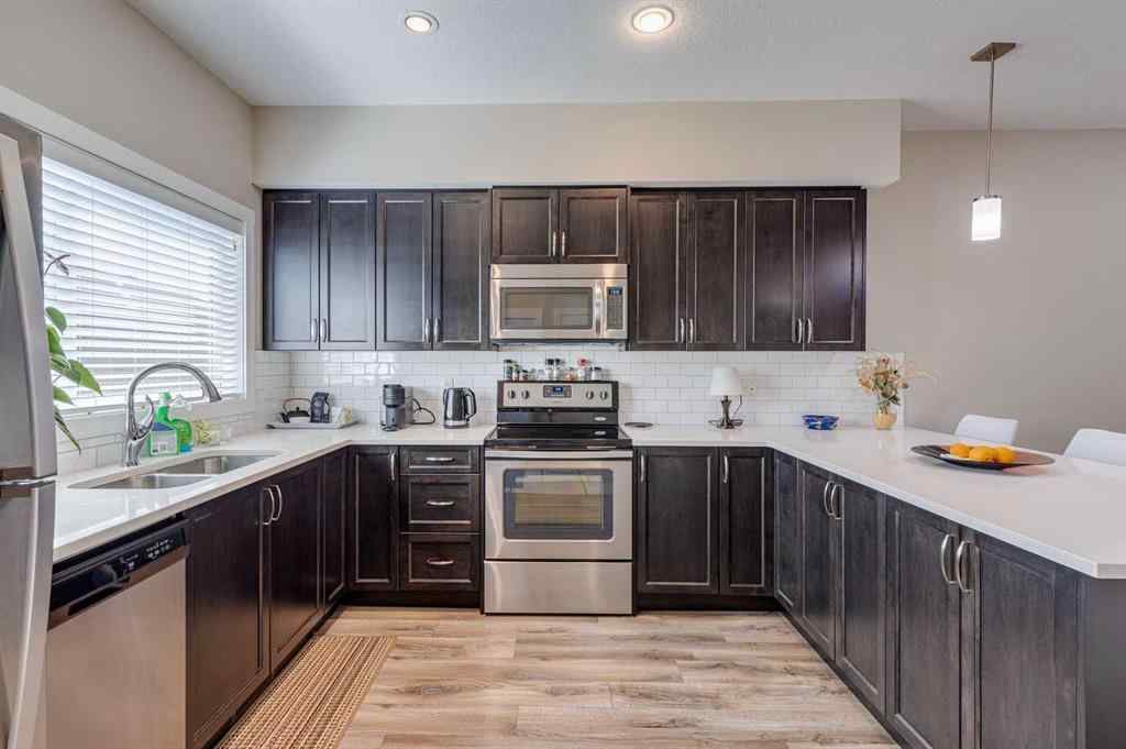 MLS® A2248286 - 385 Midtown Gate SW in Midtown Airdrie, Residential