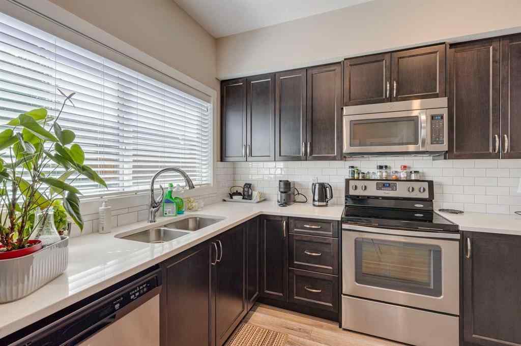 MLS® A2248286 - 385 Midtown Gate SW in Midtown Airdrie, Residential