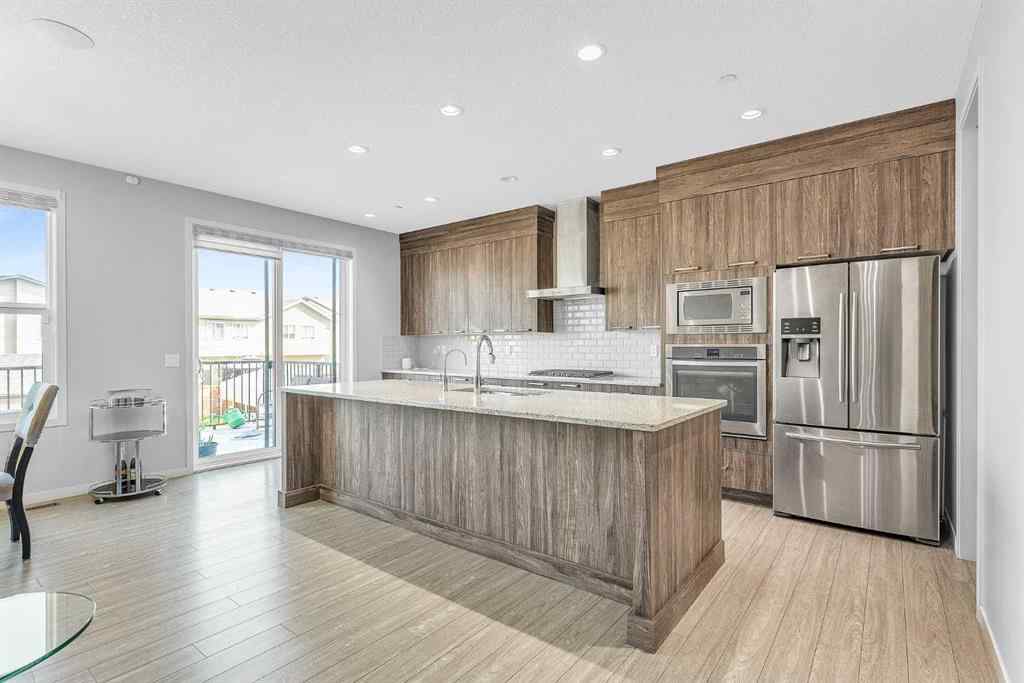 MLS® A2248301 - 69 Howse Common NE in Livingston Calgary, Residential