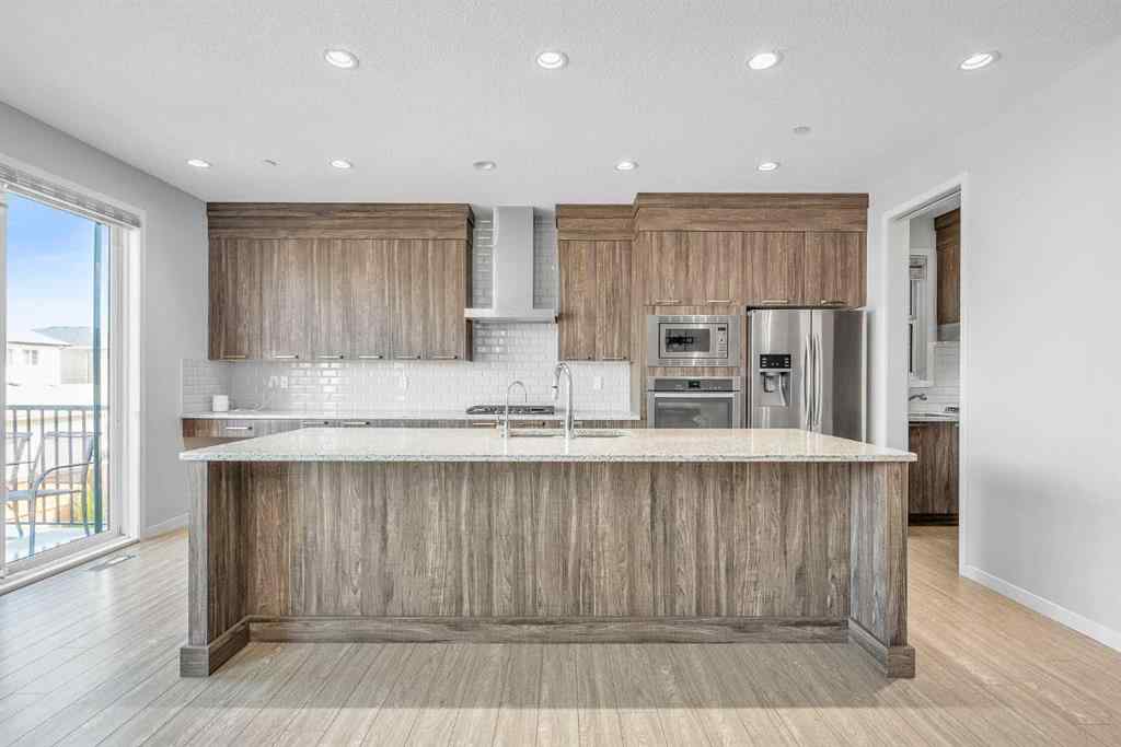 MLS® A2248301 - 69 Howse Common NE in Livingston Calgary, Residential