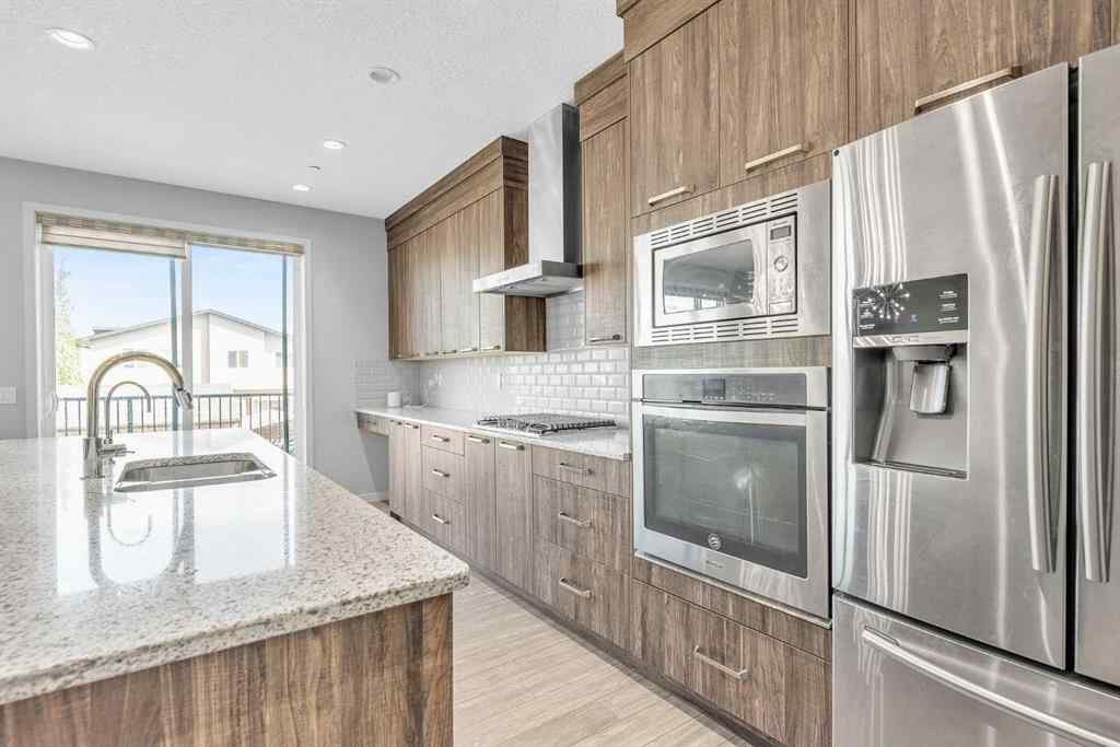 MLS® A2248301 - 69 Howse Common NE in Livingston Calgary, Residential