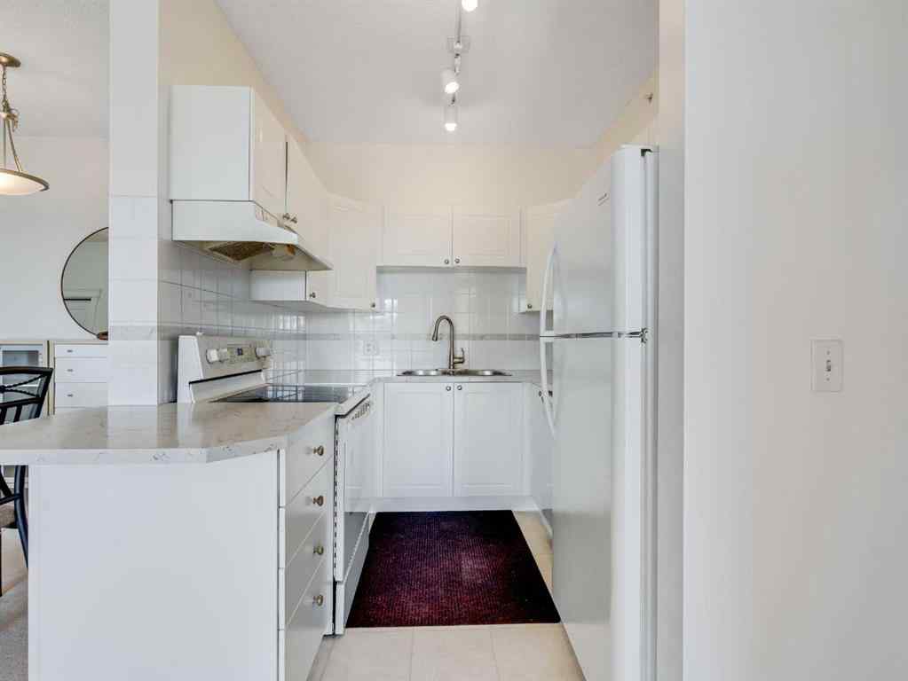 MLS® A2248319 - Unit #410 8 County Village Bay NE in Country Hills Village Calgary, Residential