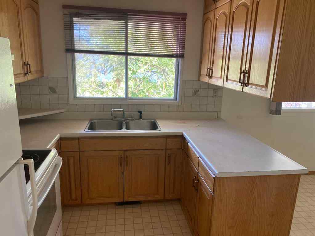 MLS® A2248322 - 9812 83 Avenue  in Patterson Place Grande Prairie, Residential