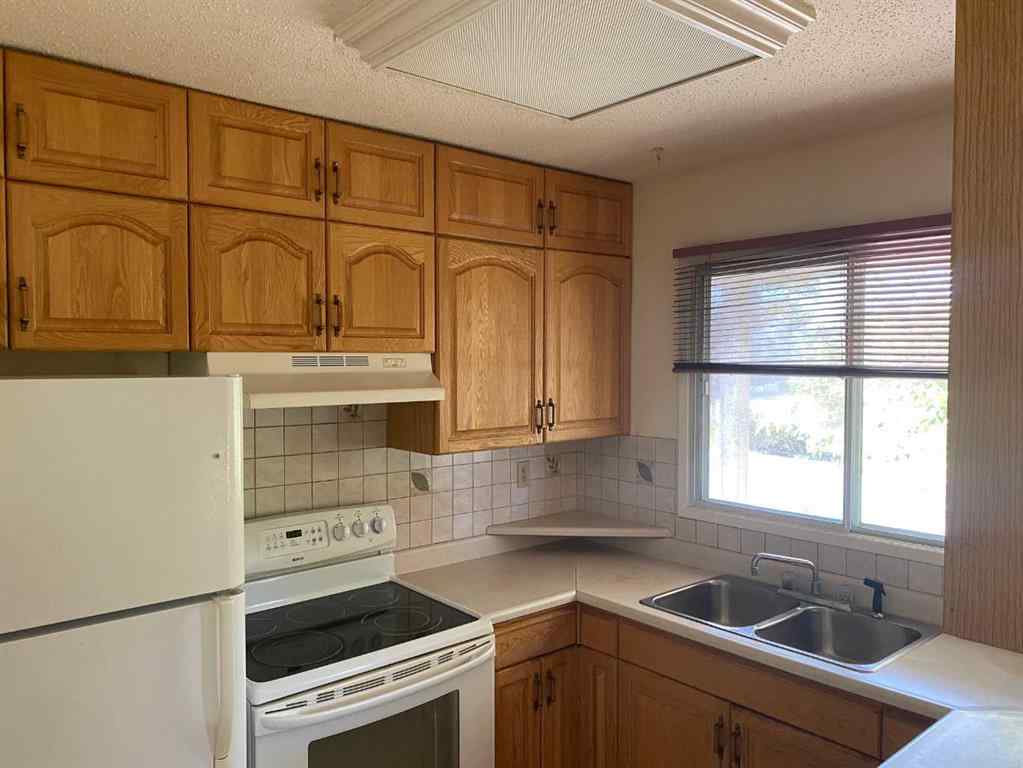 MLS® A2248322 - 9812 83 Avenue  in Patterson Place Grande Prairie, Residential
