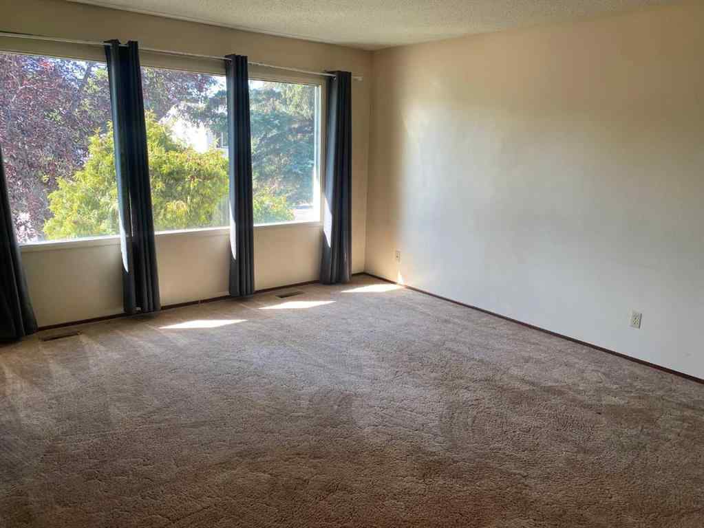MLS® A2248322 - 9812 83 Avenue  in Patterson Place Grande Prairie, Residential
