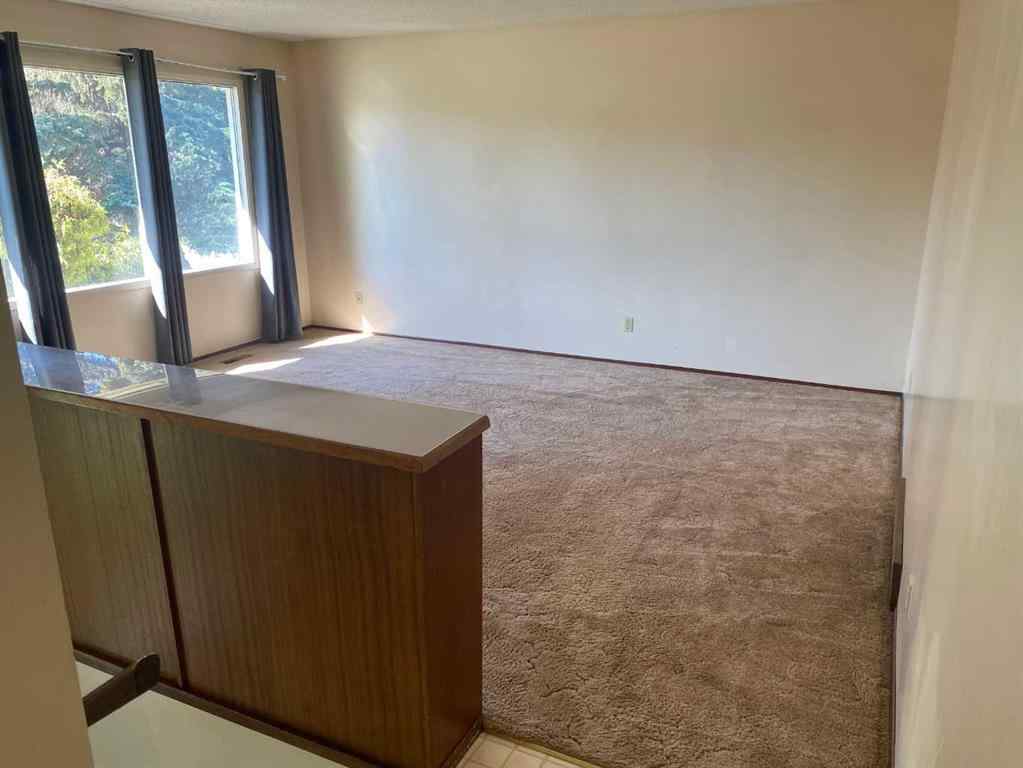 MLS® A2248322 - 9812 83 Avenue  in Patterson Place Grande Prairie, Residential