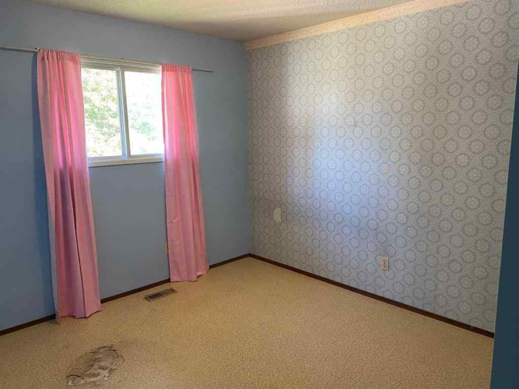 MLS® A2248322 - 9812 83 Avenue  in Patterson Place Grande Prairie, Residential