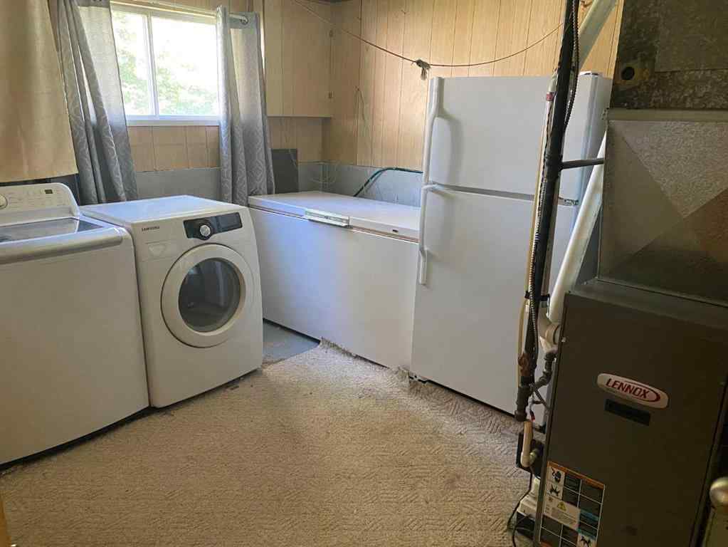 MLS® A2248322 - 9812 83 Avenue  in Patterson Place Grande Prairie, Residential