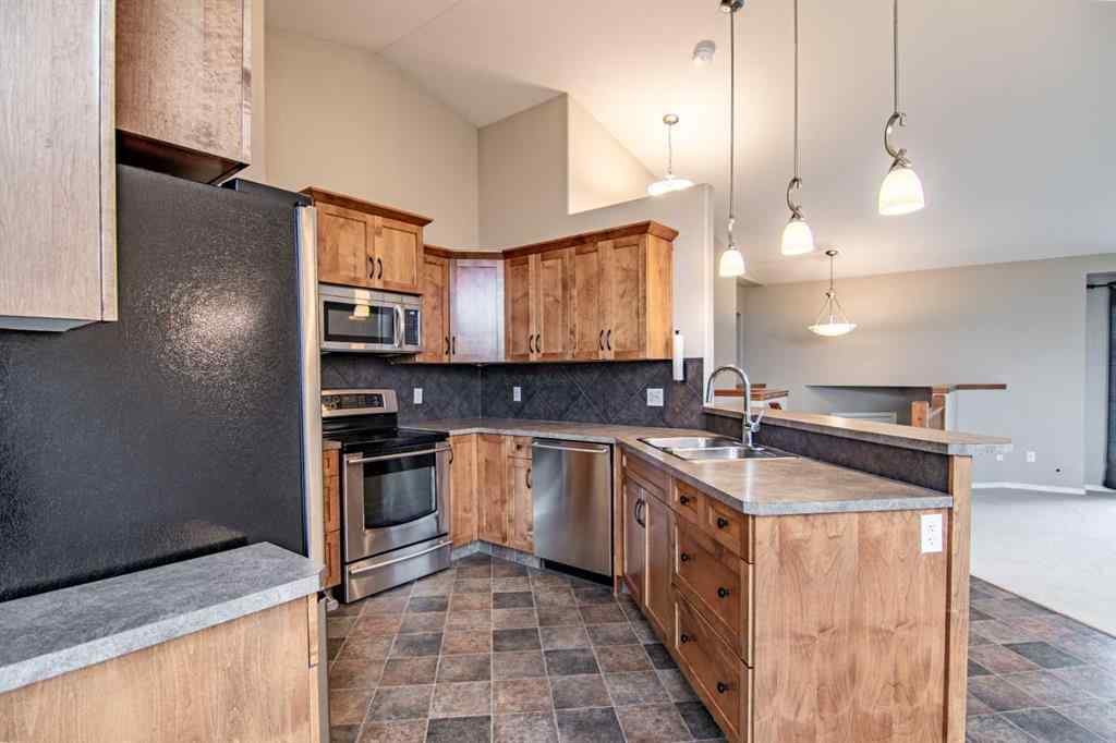 MLS® A2248337 - 61 Mann Drive  in Palisades Penhold, Residential