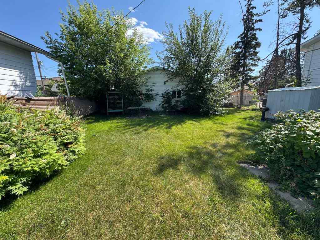 MLS® A2248353 - 9509 104 Avenue  in Hillside Grande Prairie, Residential