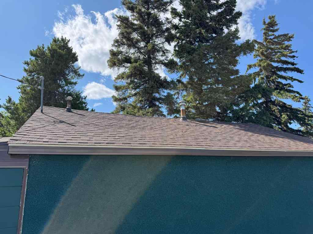 MLS® A2248353 - 9509 104 Avenue  in Hillside Grande Prairie, Residential