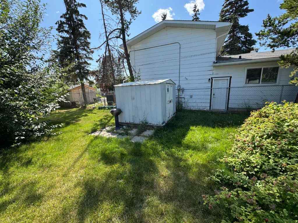 MLS® A2248353 - 9509 104 Avenue  in Hillside Grande Prairie, Residential