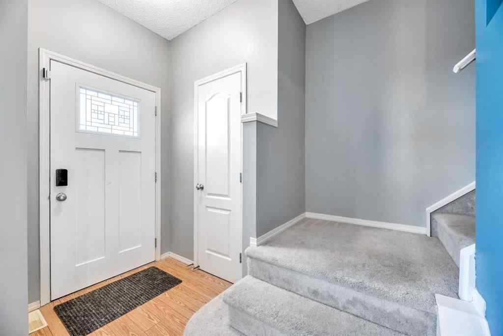 MLS® A2248377 - 205 Strathaven Mews  in Strathaven Strathmore, Residential