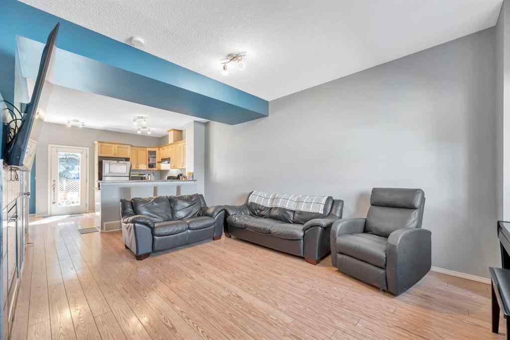 MLS® A2248377 - 205 Strathaven Mews  in Strathaven Strathmore, Residential