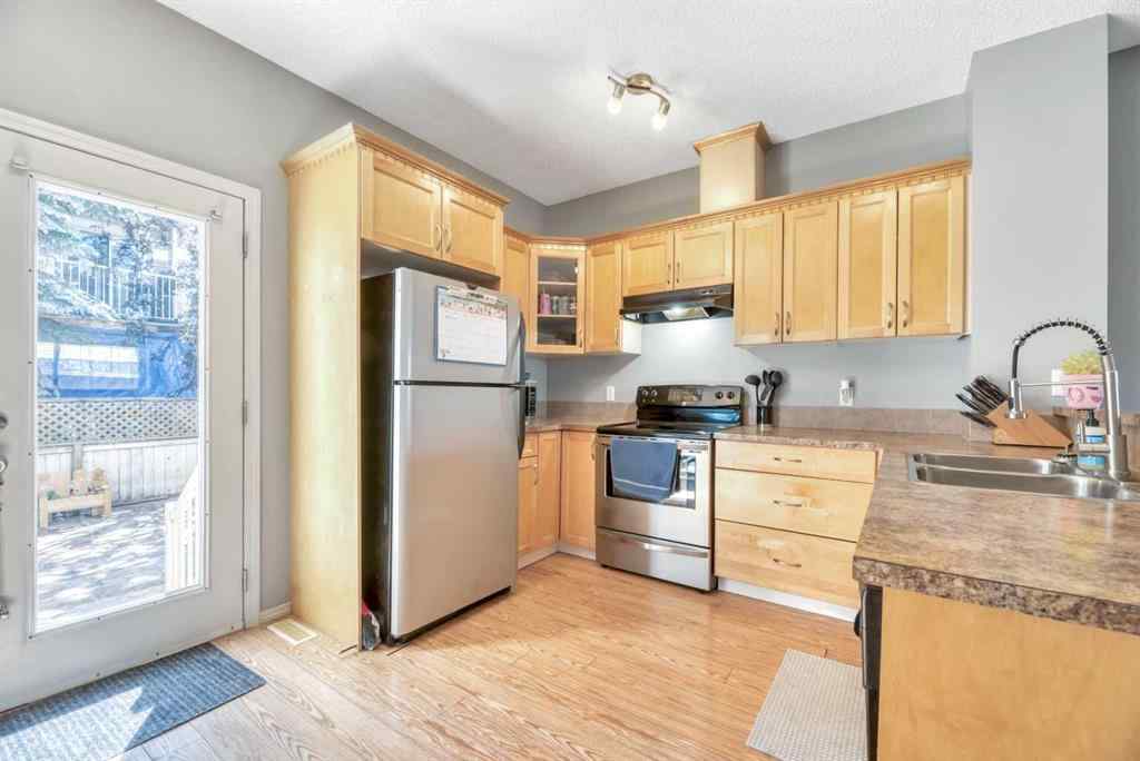 MLS® A2248377 - 205 Strathaven Mews  in Strathaven Strathmore, Residential