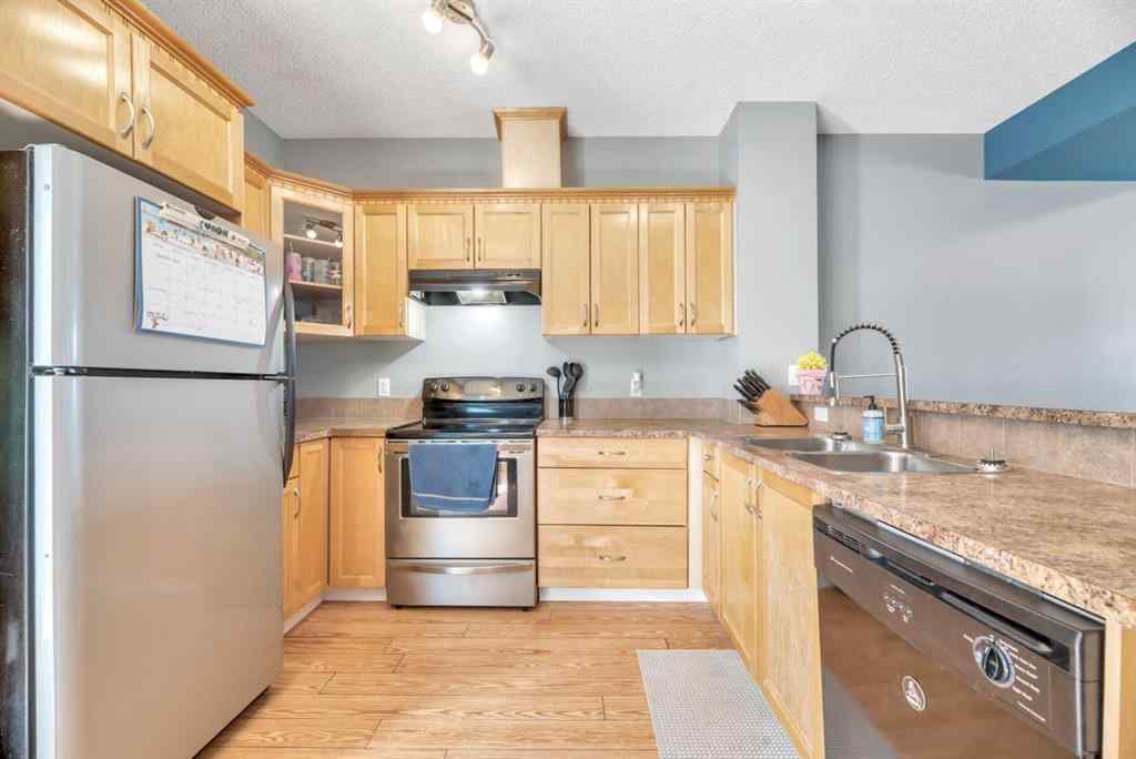 MLS® A2248377 - 205 Strathaven Mews  in Strathaven Strathmore, Residential