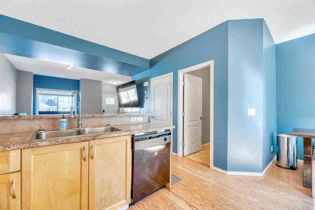 MLS® A2248377 - 205 Strathaven Mews  in Strathaven Strathmore, Residential