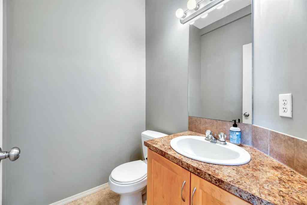 MLS® A2248377 - 205 Strathaven Mews  in Strathaven Strathmore, Residential