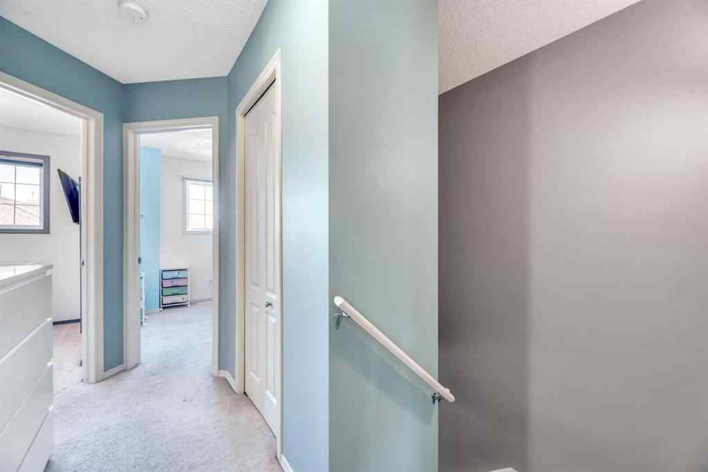 MLS® A2248377 - 205 Strathaven Mews  in Strathaven Strathmore, Residential
