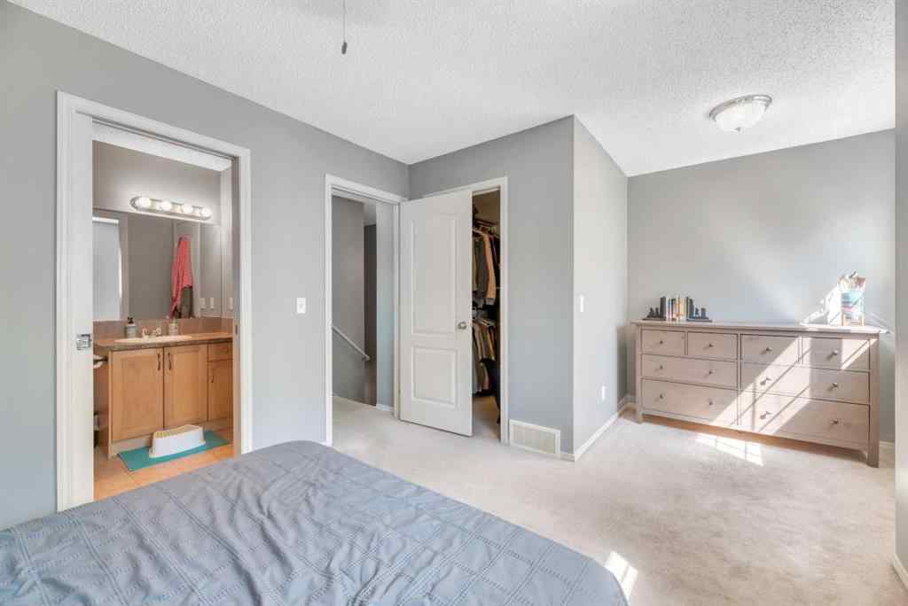 MLS® A2248377 - 205 Strathaven Mews  in Strathaven Strathmore, Residential