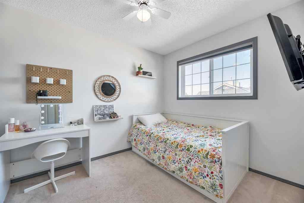 MLS® A2248377 - 205 Strathaven Mews  in Strathaven Strathmore, Residential