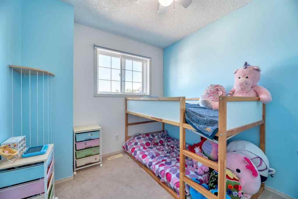 MLS® A2248377 - 205 Strathaven Mews  in Strathaven Strathmore, Residential