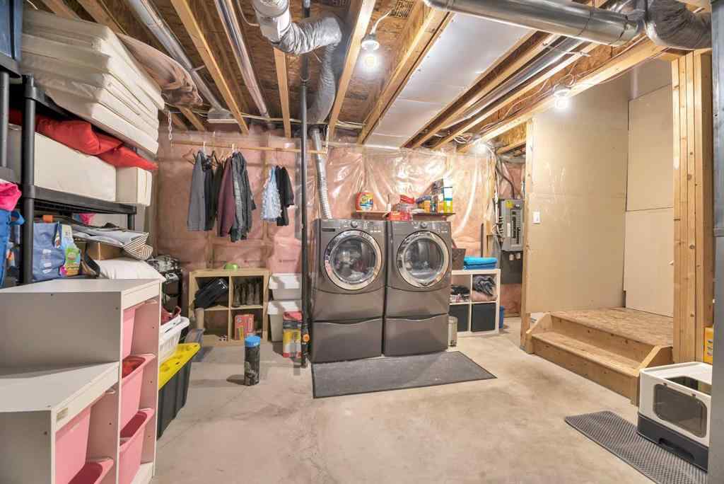 MLS® A2248377 - 205 Strathaven Mews  in Strathaven Strathmore, Residential