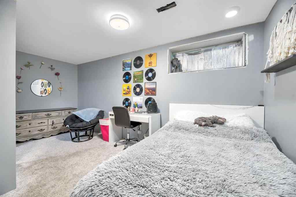 MLS® A2248377 - 205 Strathaven Mews  in Strathaven Strathmore, Residential