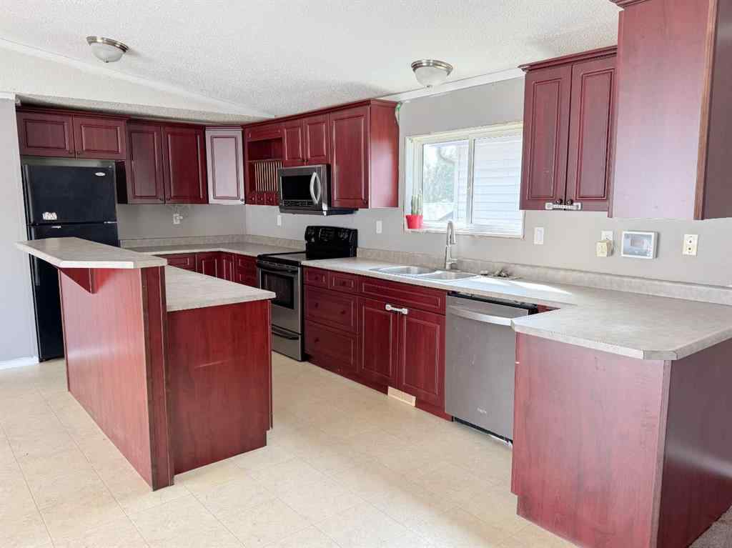 MLS® A2248383 - 8805 91 Street  in MH - Creekside Grande Prairie, Residential