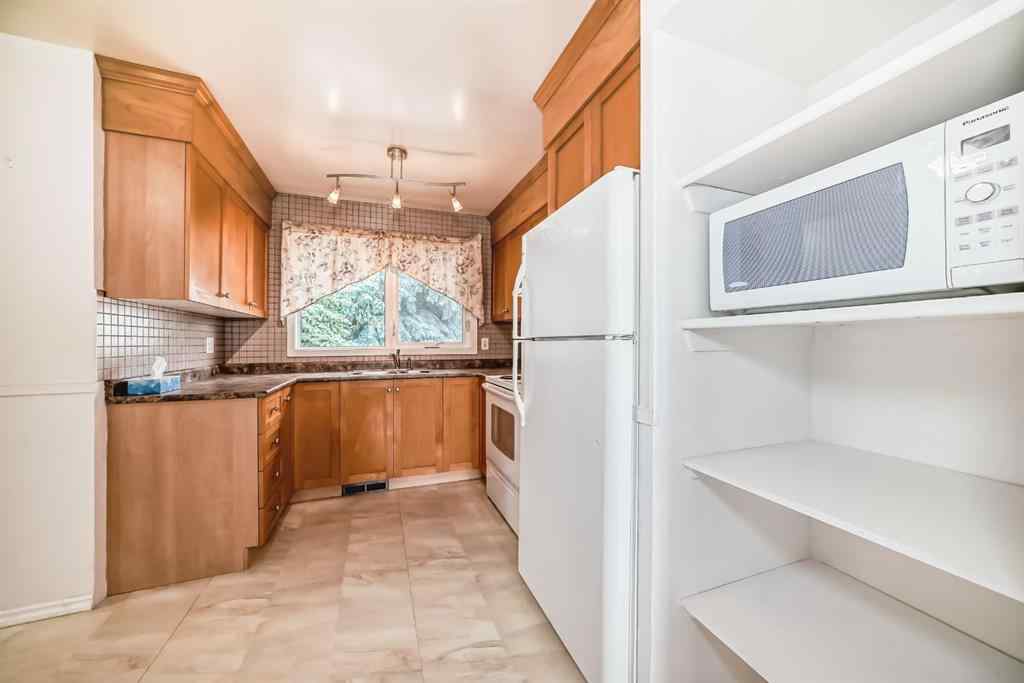 MLS® A2248385 - 5036 Marshall Road NE in Marlborough Calgary, Residential