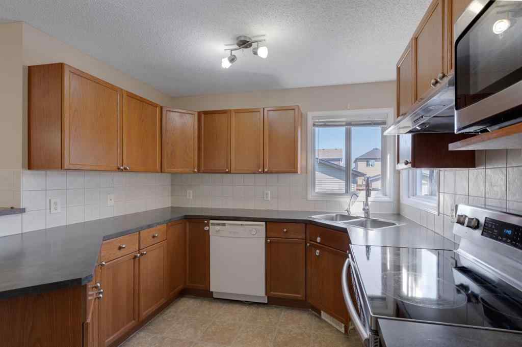 MLS® A2248432 - 427 Saddlebrook Way NE in Saddle Ridge Calgary, Residential