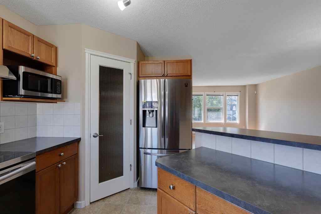 MLS® A2248432 - 427 Saddlebrook Way NE in Saddle Ridge Calgary, Residential