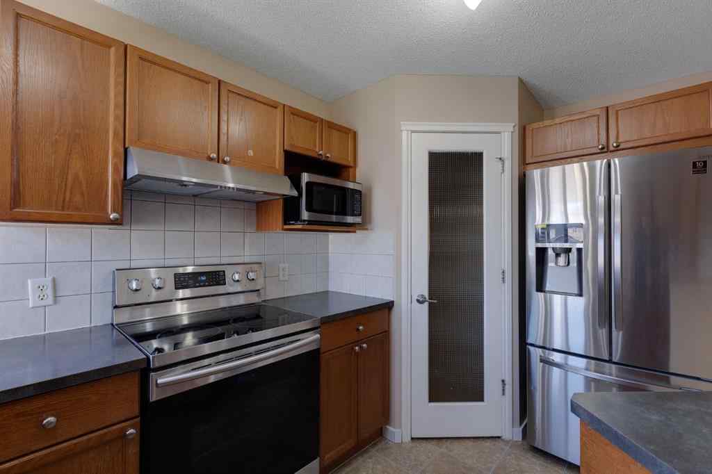 MLS® A2248432 - 427 Saddlebrook Way NE in Saddle Ridge Calgary, Residential