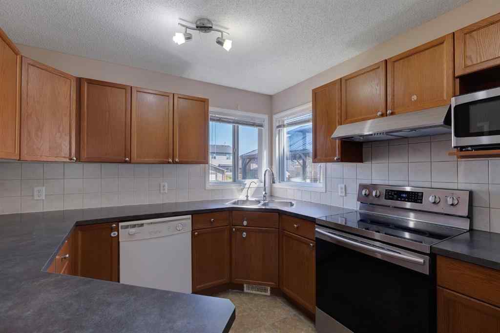 MLS® A2248432 - 427 Saddlebrook Way NE in Saddle Ridge Calgary, Residential
