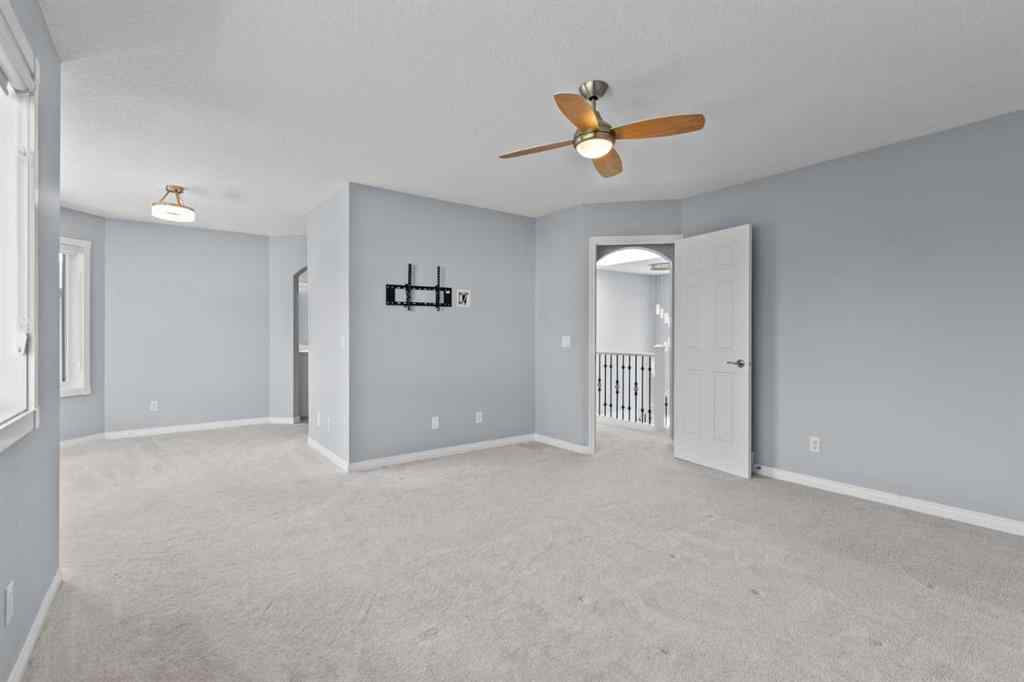 MLS® A2248436 - 74 Simcrest Manor SW in Signal Hill Calgary, Residential
