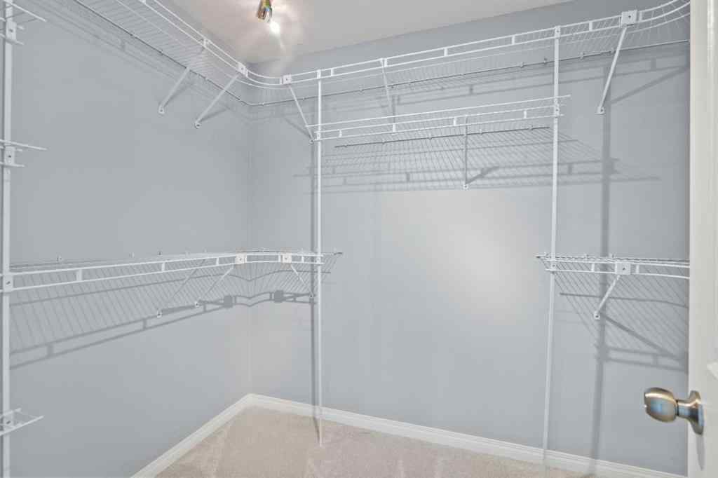 MLS® A2248436 - 74 Simcrest Manor SW in Signal Hill Calgary, Residential