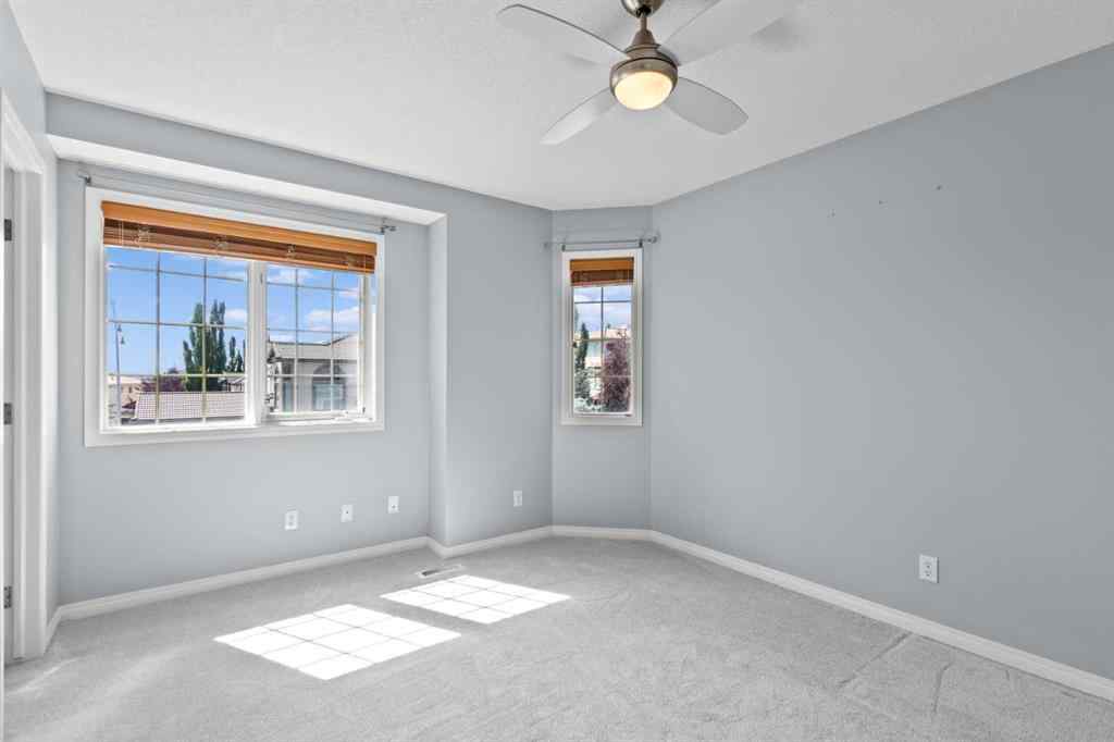 MLS® A2248436 - 74 Simcrest Manor SW in Signal Hill Calgary, Residential