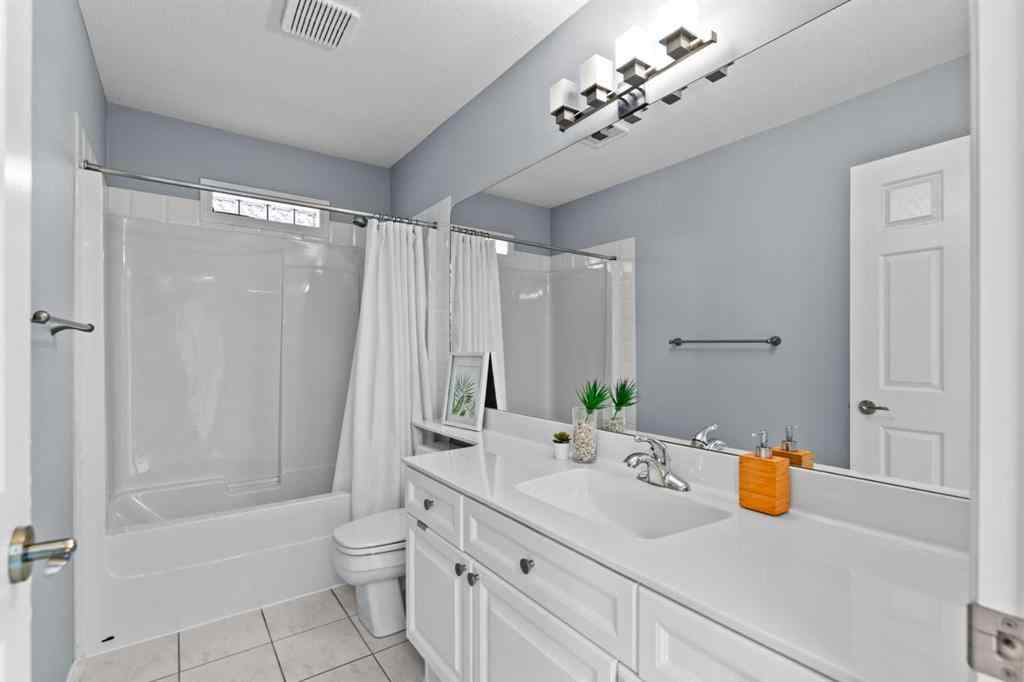 MLS® A2248436 - 74 Simcrest Manor SW in Signal Hill Calgary, Residential