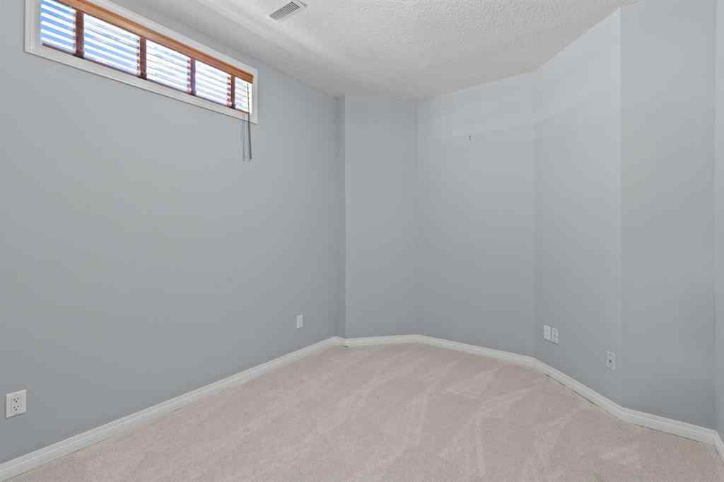 MLS® A2248436 - 74 Simcrest Manor SW in Signal Hill Calgary, Residential