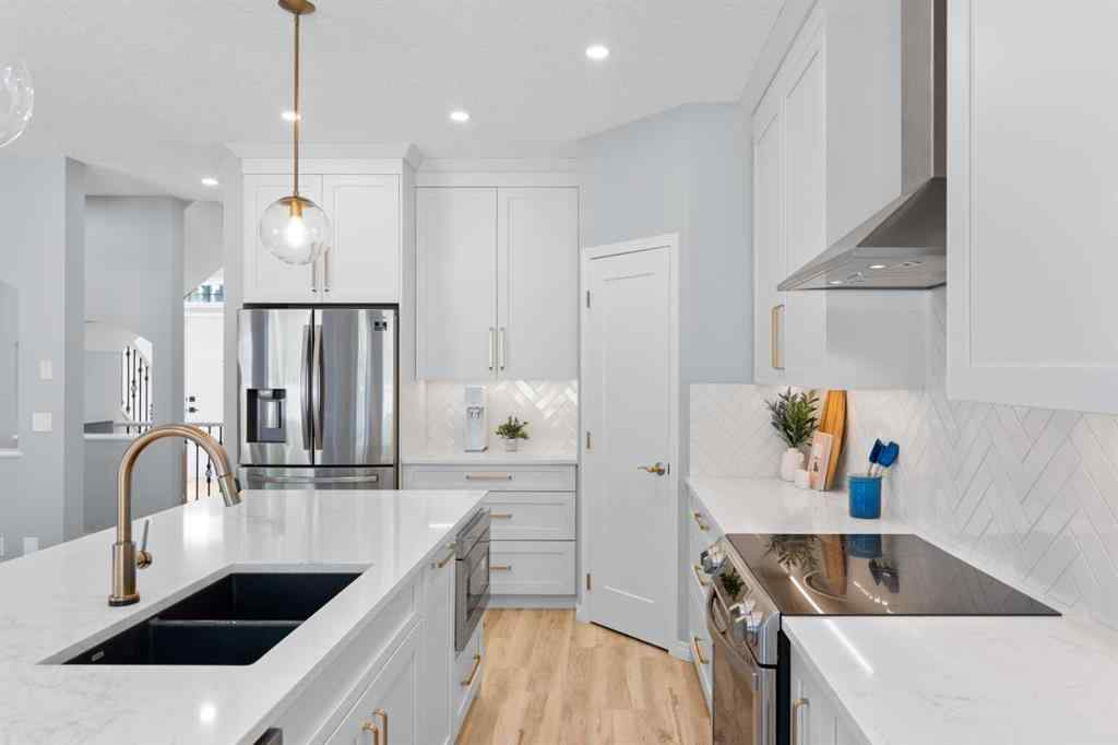 MLS® A2248436 - 74 Simcrest Manor SW in Signal Hill Calgary, Residential